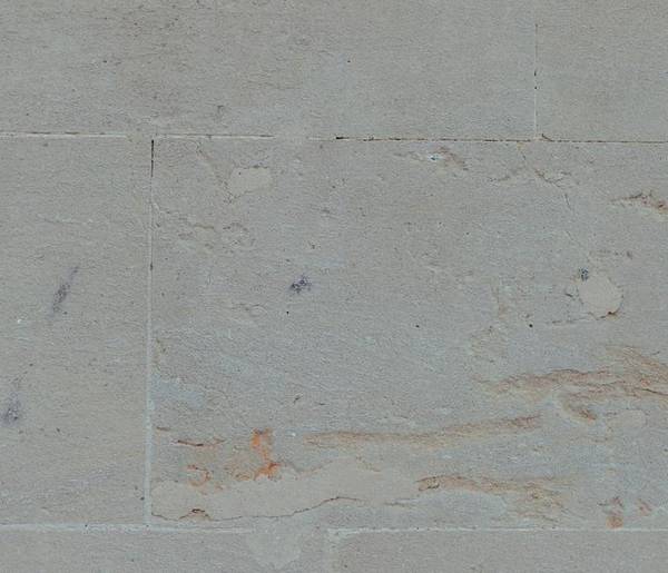 Cool blue grey limestone blocks with faint rust veining