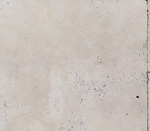 Pale cream travertine slab with soft natural pitting